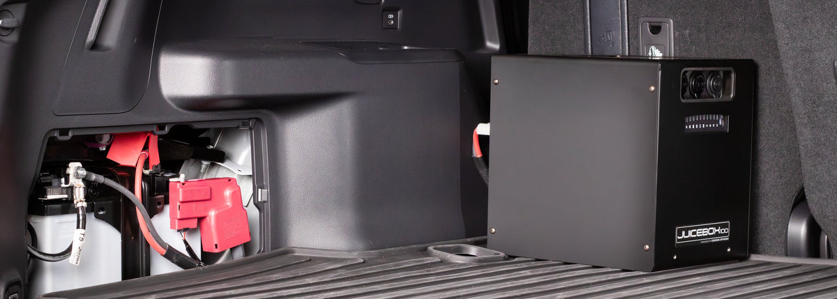 Juicebox 100 installed in a Toyota Land Cruiser with the cranking battery visible